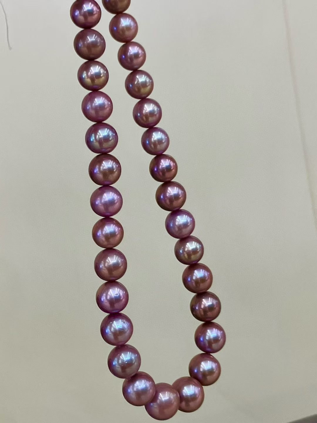High quality reddish purple color Edison pearls necklace