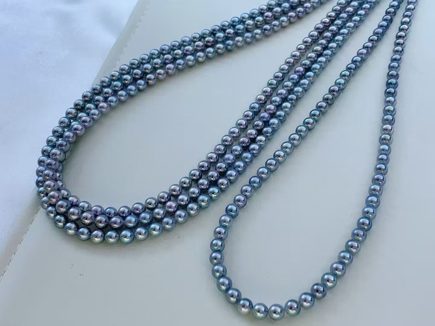 Top quality aurora silver blue rose color seawater akoya pearls necklace