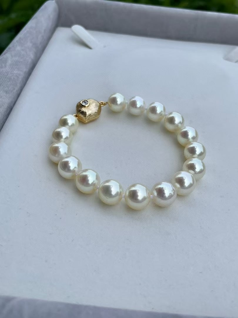 Top quality aurora “feather gold”color seawater akoya pearls bracelet