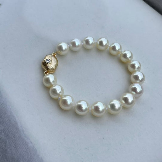 Top quality aurora “feather gold”color seawater akoya pearls bracelet