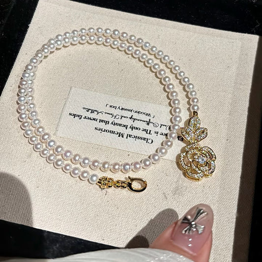 High quality white color with camellia buckle freshwater pearls necklace